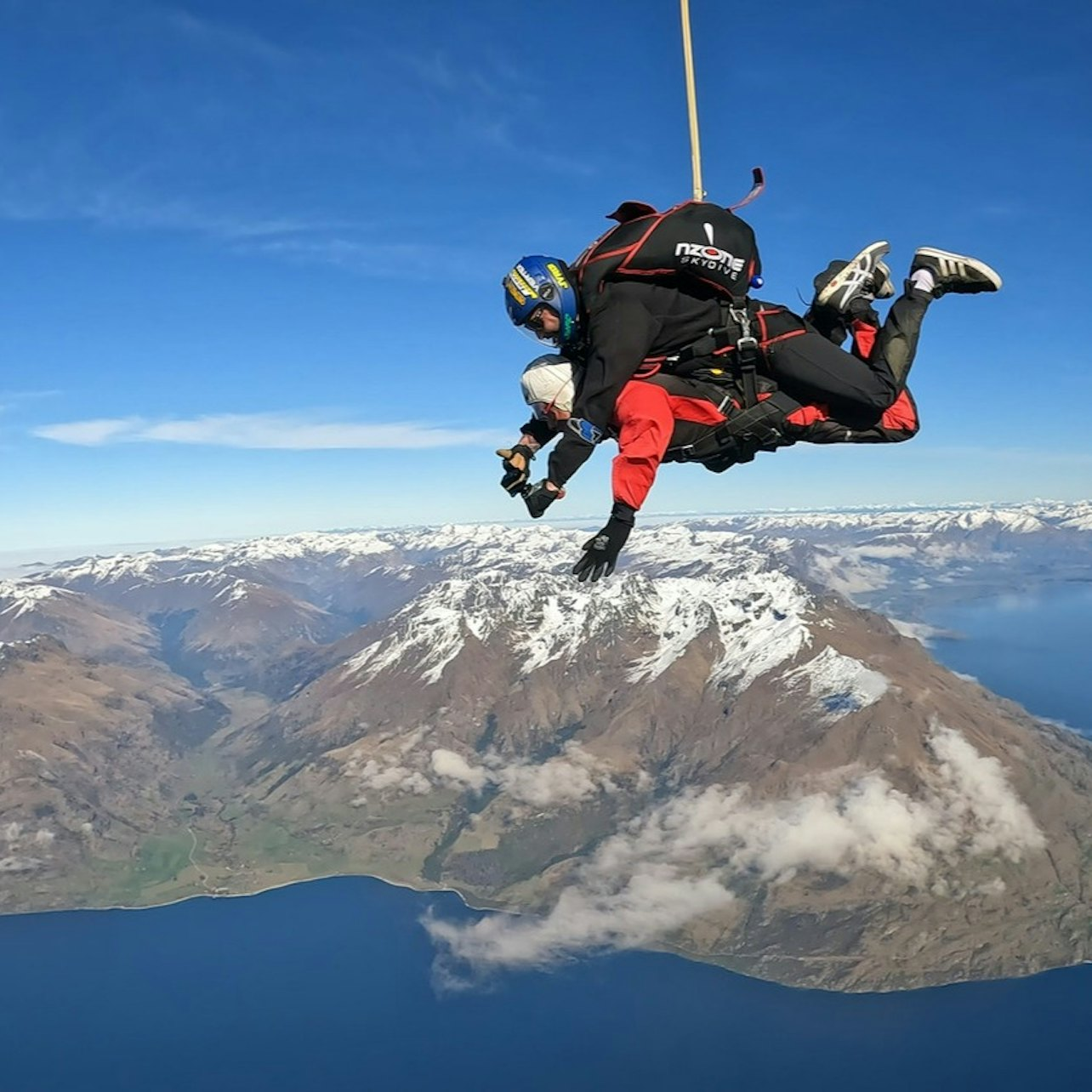 Experience a breathtaking freefall from 15000ft above Queenstown surrounded by majestic mountains and shimmering lakes making every second a memorable adventure for thrill-seekers.